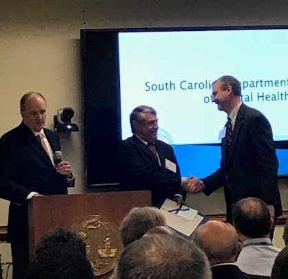 L-R: Alan Powell, State Director John H. Magill, Stewart Cooner L-R: Alan Powell, State Director John H. Magill, Stewart Cooner